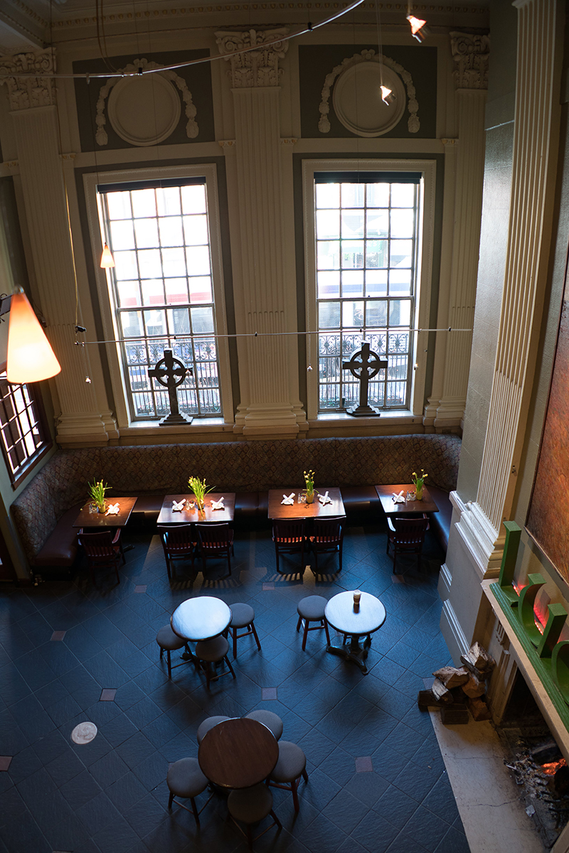 The grand arched windows and Celtic crosses overlooking 2nd Street at The Plough and The Stars