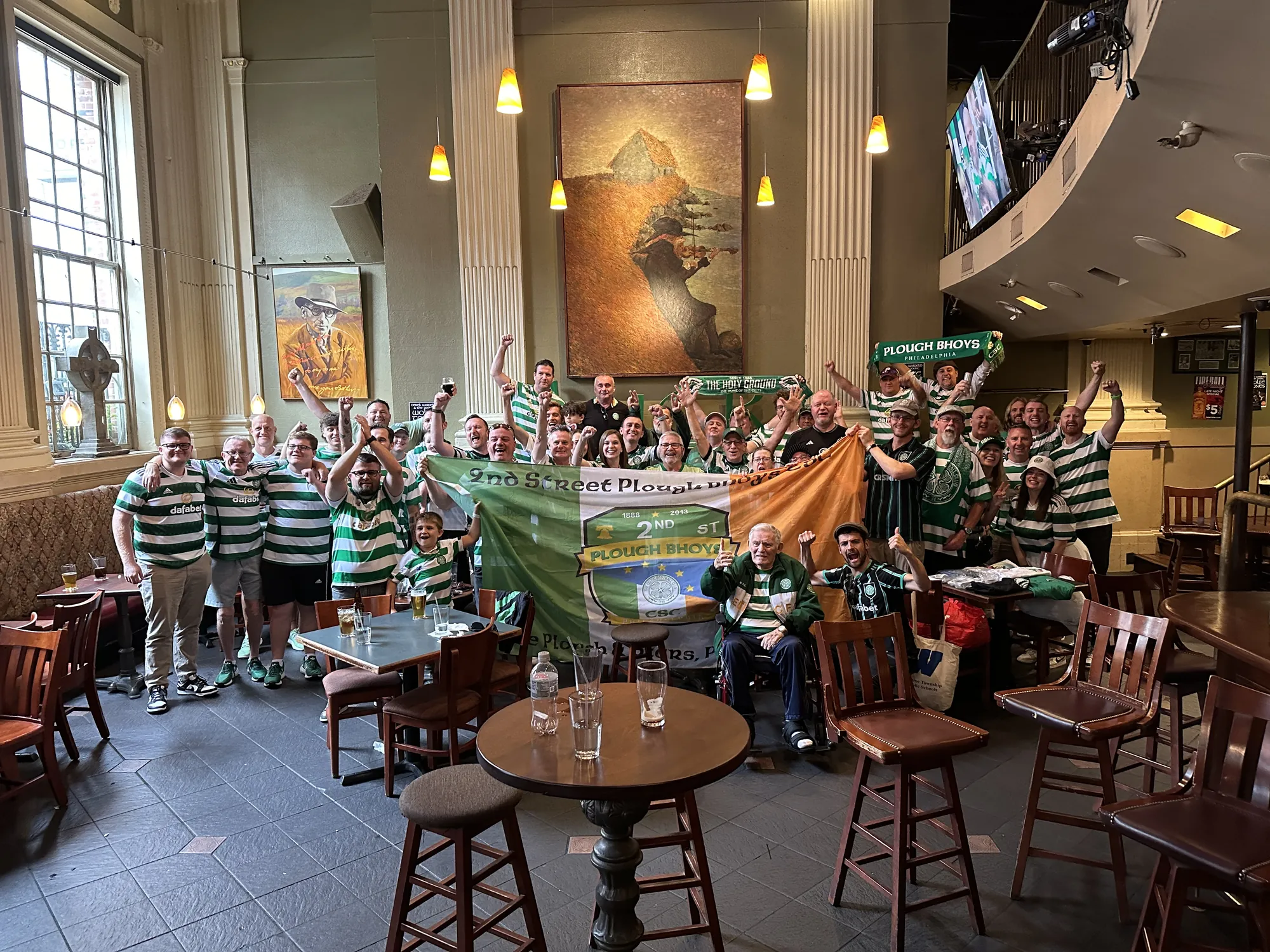 Plough Bhoys Celtic Supporters Club gathered inside The Plough and The Stars with their 2nd Street banner